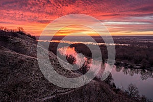 Scenic landscape with the diabolic sky over the Pepper Mountains and Vistula River, Sandomierz, Holy Cross Province, Poland