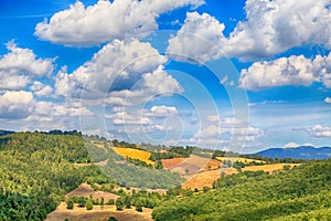 Scenic landscape with green hills and beautiful cloudscape in Tu