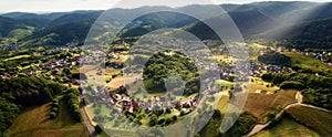 Scenic landscape with idyllic town from above