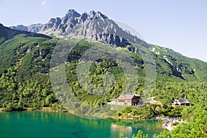 Scenic landscape with lake view of a hut in the High Tatras