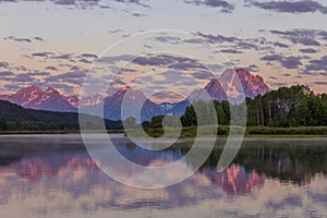 Scenic Landscape Sunrise Reflection in Summer in the Tetons