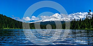 Scenic landscape of Trillium Lake and Mount Hood on a sunny day, early summer or late spring, Oregon