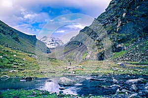 Scenic landscape view fo colorful valley on the trail  to Hampta Pass in Himalaya
