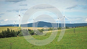 Scenic landscape of the wind turbines for electric power make against nature agriculture farm for renewable clean power