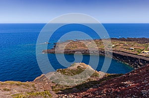 Scenic lava rock cliff  in the Linosa island. Sicily