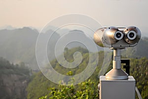 Scenic lookout binoculars Vietnamese island Cat Ba