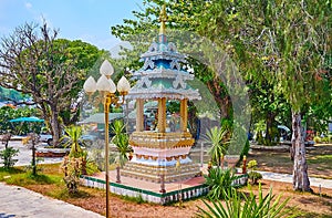 The mondop shrine in garden of Wat Chong Kham Temple, Mae Hong Son, Thailand photo