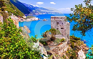 scenic Monterosso al mare , view with medieval castle and sea.