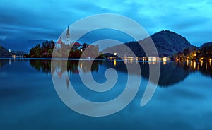 Scenic morning view of St. Martin`s Parish Church near Bled Lake. Beautiful autumn weather during sunrise.