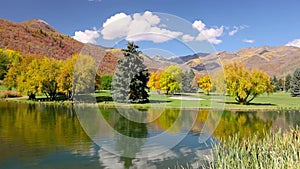 Scenic mountain lake with colorful autumn trees, Wasatch mountains