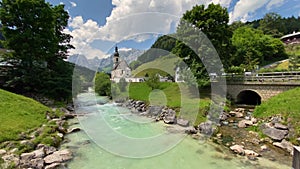 Scenic mountain landscape in the Bavarian Alps with famous Parish Church of St. Sebastian in the village of Ramsau, Nationalpark