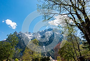 Scenic Mountain Landscape in Bayern Mittenwald in a sunny day, with Blue Sky and Trees