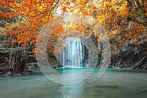 Scenic of nature with Beautiful Waterfall  in autumn forest at Erawan  National Park,