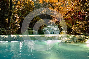 Scenic of nature with Beautiful Waterfall in autumn forest at Erawan National Park