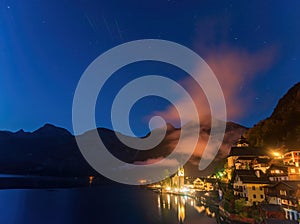 Scenic night scape of famous Hallstatt mountain village in the Alps at early morning, Austria