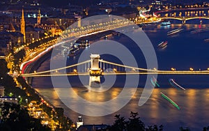 Scenic night view of Chain Bridge and embankment on Danube river in Budapest, Hungary