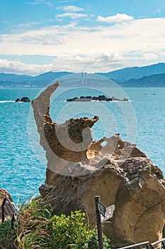 Scenic Ocean Portrait View with Amazing Clouds and Sea-erosion Rock Formation at Yehliu Geopark, Taiwan