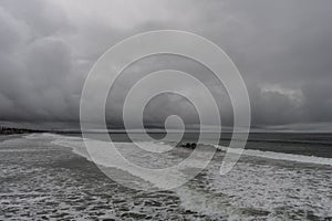 Scenic Oceanside vista viewed from the pier on a rainy winter day