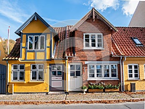 Scenic old houses along Kirkestraede in old town of Bogense, Funen, Denmark