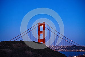 June 2022 Moon Rise seen through North tower of Golden Gate Bridge San Francisco