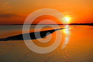 Scenic orange sunset on the Baltic sea coast, Parnu, Estonia