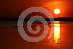 Scenic orange sunset on the Baltic sea coast, Parnu, Estonia