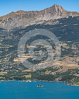 Scenic panorama of the Lake of Serre-Poncon, one of the largest reservoirs in Europe, Hautes-Alpes