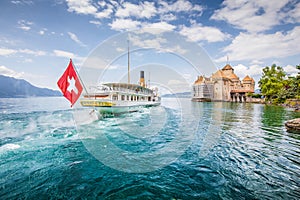 Paddle steamer with famous Chateau de Chillon at Lake Geneva, Ca