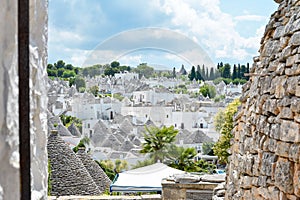 Scenic panoramic view of Alberobello town and its typical trulli buildings, Apulia, Italy. UNESCO World Heritage site.