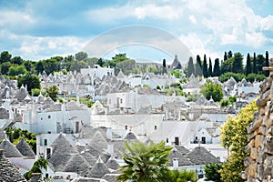 Scenic panoramic view of Alberobello town and its typical trulli buildings, Apulia, Italy. UNESCO World Heritage site.