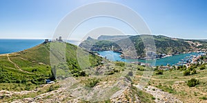 Scenic panoramic view of Balaclava bay with yachts from the ruines of Genoese fortress Chembalo. Balaklava, Sevastopol, Crimea.