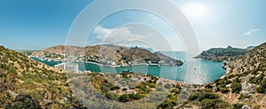 Scenic panoramic view of Balaclava bay with yachts from the ruines of Genoese fortress Chembalo. Balaklava, Sevastopol, Crimea.