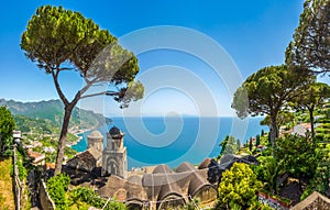 Scenic picture-postcard view of famous Amalfi Coast from Villa Rufolo gardens in Ravello, Italy