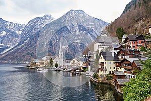 Scenic picture-postcard view of famous Hallstatt mountain village in the Austrian Alps. Beautiful view in autumn