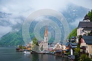 Scenic picture-postcard view of famous Hallstatt mountain village with Hallstaetter See in the Austrian Alps, region of