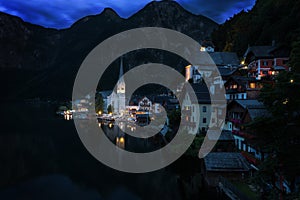 Scenic picture-postcard view of famous historic Hallstatt mountain village with Hallstattersee in the Austrian Alps in mystic