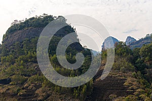 Scenic picture of the tall strange shaped rocks in Wuyishan Scenic area, China