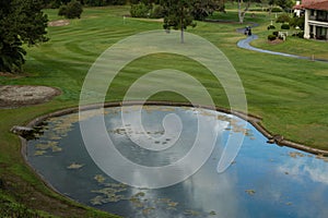 Scenic pond reflecting dramatic sky in Escondido, California