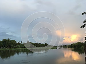 Scenic river view at sunset, Nakorn Chaisri, Thailand