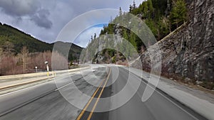 Scenic Road on a Sunny Day. Blue Sky, Clouds and Trees. Sea to Sky Highway near Squamish