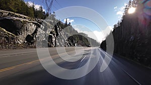 Scenic Road on a Sunny Day. Blue Sky, Clouds and Trees. Sea to Sky Highway near Squamish