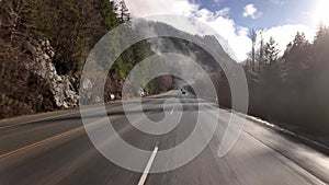 Scenic Road on a Sunny Day. Blue Sky, Clouds and Trees. Sea to Sky Highway near Squamish