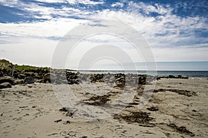 Scenic rocks and large boulders on Refsnesstranda beach near Naerbo