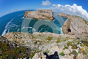 Scenic rocks in the ocean near Cabo de Sao Vicente Cape in the Algarve, Portugal