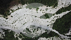 Scenic route to Mandrioli mountain pass. Vertical view of bends