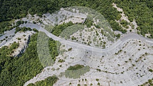 Scenic route to Mandrioli mountain pass. Vertical view of bends