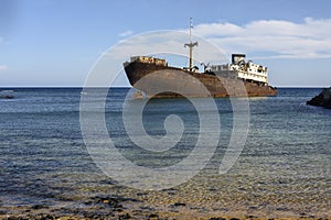 Scenic rusted ship near Arrecife harbor on Lanzarote, Canary Islands, Spain