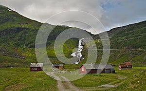 Scenic scandinavian house in green landscape of Norway