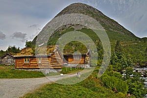 Scenic scandinavian house in green landscape of Norway