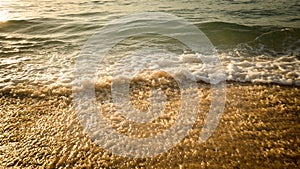 Scenic seascape. Milky foam waves at the beach. Sunset time. Waterscape for background. Selected soft art focus. Sunlight